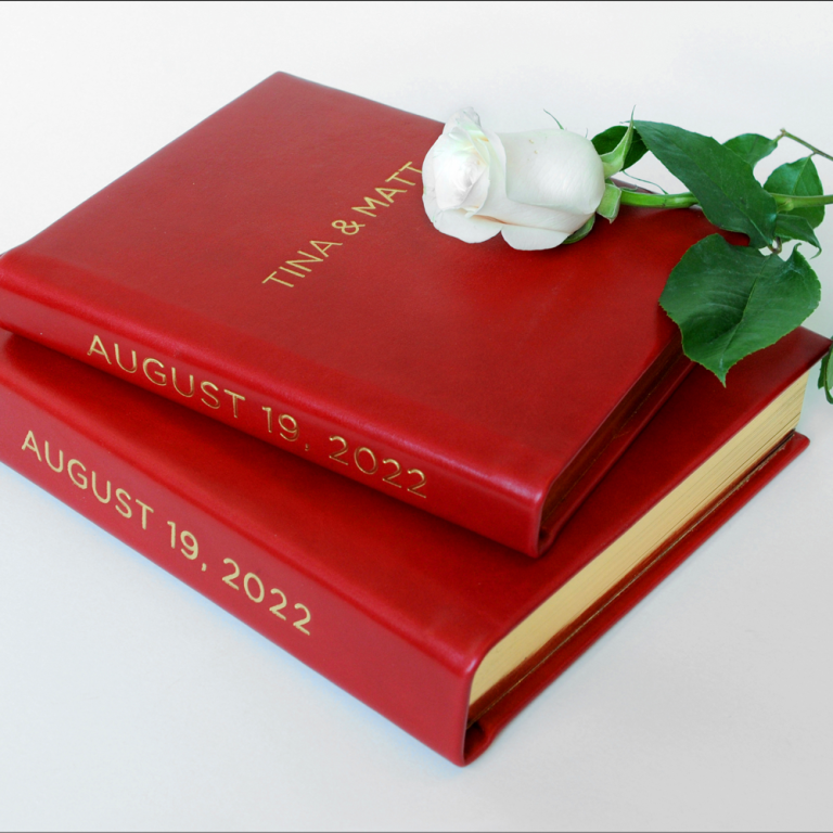 Set of couple's wedding album and a smaller parents album with a rich, bright red leather and Genuine 24 Karat Gold foil stamping.